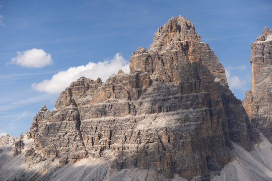 Mountain landscape panorama Tre Cime Mount against a blue summer background. 
