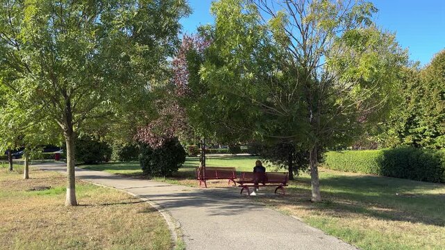 San Lazzaro di Savena public park with trees, walking paths and green spaces, Bologna, Emilia-Romagna, Italy