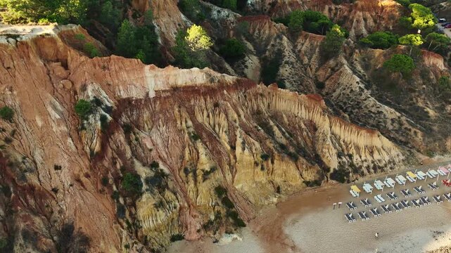 Aerial rocks and cliffs seascape shore view of famous Falesia beach, Algarve.