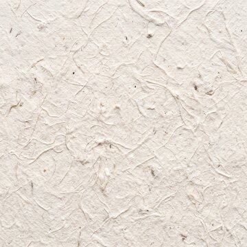Handmade cotton paper texture, off-white background with natural fibers, top view