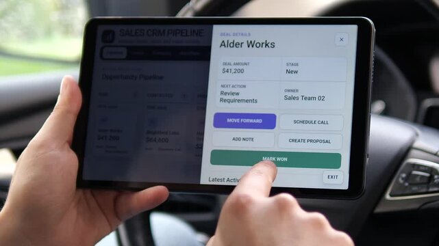 User reviews a CRM sales pipeline on a tablet and marks a deal as won, highlighting digital sales automation, revenue tracking and modern customer management.