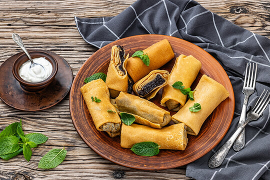 sweet thin rolled crepes with poppy seed