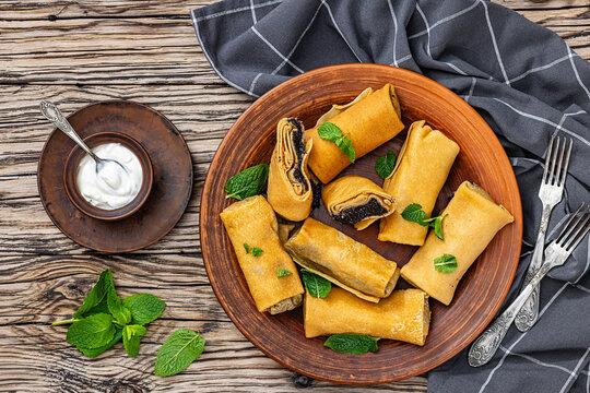 sweet thin rolled crepes with poppy seed