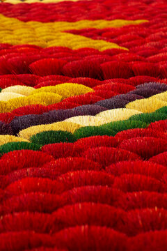 Colorful incense sticks in the craft village of Quang Phu Cau. Natural background.