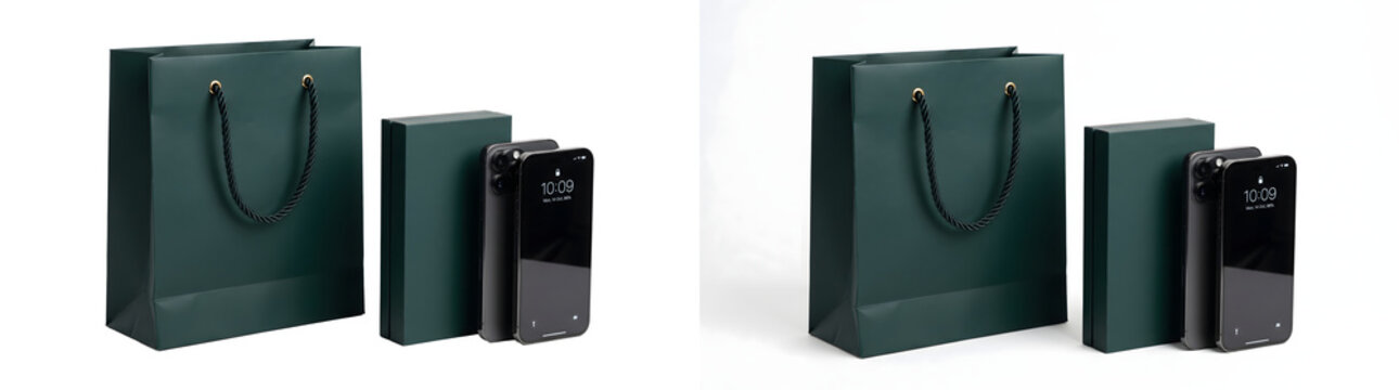 Gift packaging set mockup in matte dark green with paper bag twisted rope handles black smartphone and rigid gift box on clean white background