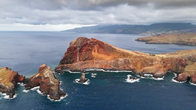 Rock formations and steep coastal cliffs at Ponta de Sao Lourenco, Madeira, Portugal. Island coastline with exposed rock faces