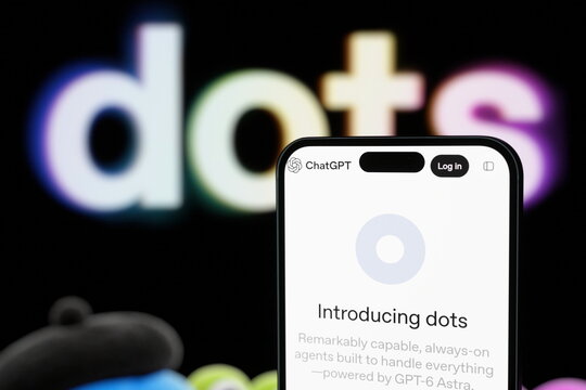 The dots website displayed on a smartphone screen. OpenAI Cancels AI Model Over Safety Concerns, Launches 'dots' Agent Tool. September 30, 2026, Lisbon, Portugal.