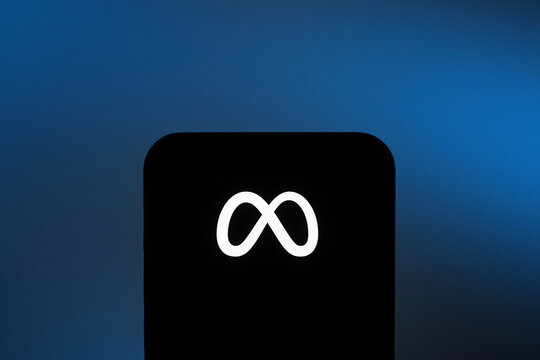 Front view: the Meta logo displayed on a smartphone screen. Meta is rolling out its Muse AI model to small businesses as part of its open-weight AI push. September 30, 2026, Lisbon, Portugal.
