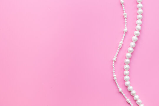 Natural white pearls - beads for jewelry, top view. Precious and elegance concept background