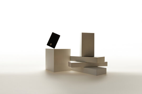 Black Credit Card Mockup on Geometric Podium and Minimal Blocks Background
