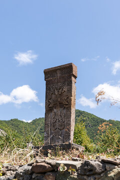 Ornate Armenian khachkar cross-stone standing at Haghpat Monastery built between the 10th and 13th century also known as Haghpatavank, a medieval Armenian monastery complex in Haghpat, Armenia