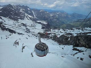 ski chairlift and gondola car in titlis, swiss © Kanishk