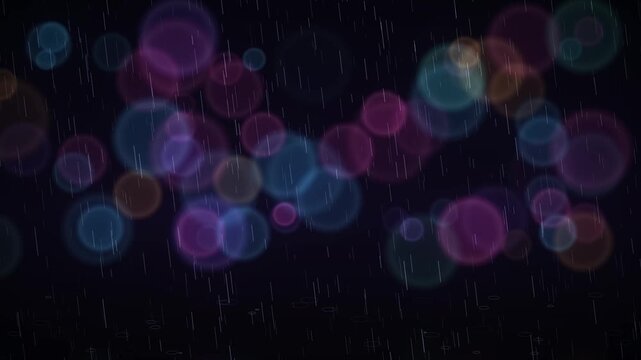 Abstract colorful bokeh lights and rain streaks on a dark background