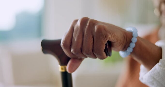 Hands, home and senior woman with walking stick for wellness, support and balance in retirement. Thinking, closeup and elderly person with cane for help, arthritis and mobility with reflection