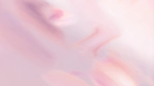 Softly glowing human faces blur and fade in pastel pink, peach, and beige tones with gentle diffusion and soft focus effects. Layered pink and peach tones enhance movement and depth.
