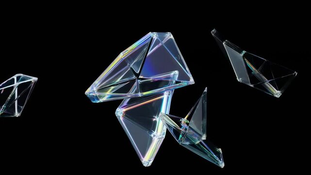 Transparent geometric glass-like shapes float and rotate against a black background with iridescent light effects. Animated texture shows geometric shapes and polyhedrons with rotating.