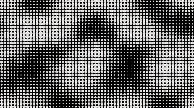 Abstract black and white halftone dot pattern background texture.