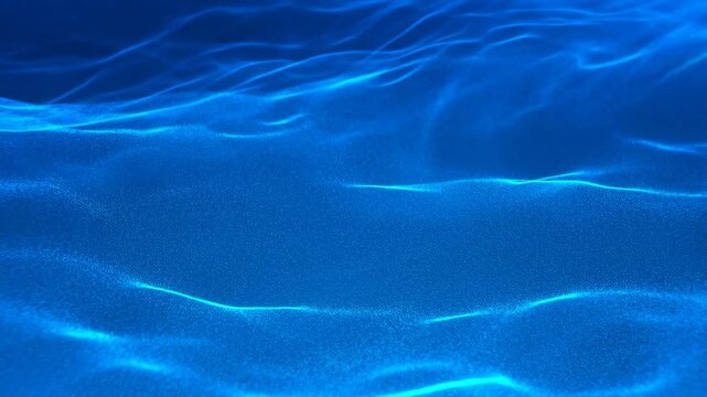 Blue flowing light patterns ripple across a dark fluid abstract background. Wellness media, website hero section, and ambient display.