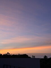 Fototapeta premium Pastel Sunset Sky Over Tropical Ocean in Bali