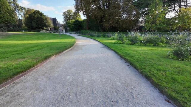 Pathway leading through the gardens of Ch&acirc;teau de Chaumont-sur-Loire toward the estate exit