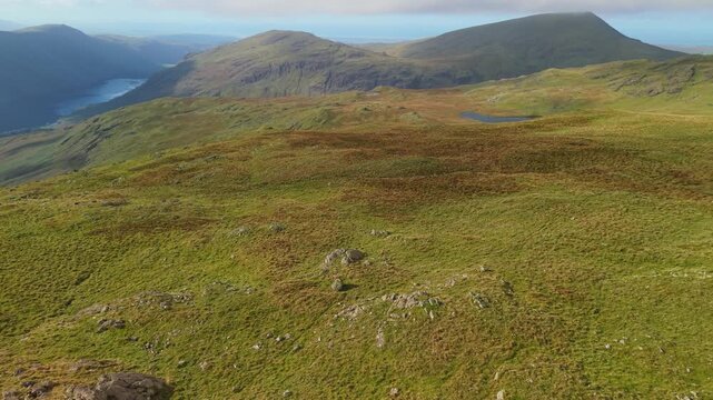 Aerial panoramic views from the Yewbarrow North Top to the Wasdale Head, Wast Water, Scafell, Kirk Fell.  Scenic Drone POV Exploration of the Lake District National Park, Cumbria, UK.