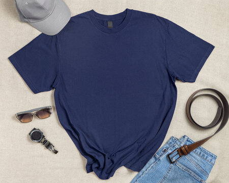 Blank dark blue unisex t-shirt mockup, crewneck flat lay with denim jeans and mens accessories