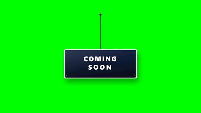 Hanging sign board with coming soon text isolated on green screen background.