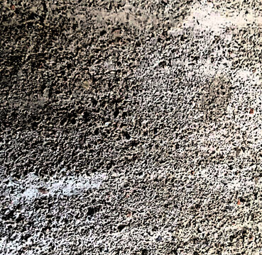 Granite texture displays a speckled gray and black stone surface