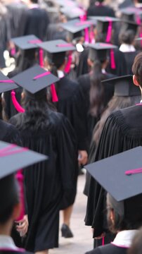 	
backside graduation hats during commencement success graduates of the university, Concept education congratulation. Graduation Ceremony ,Congratulated the graduates in University during commencement