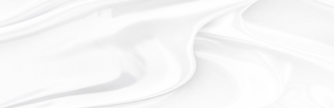 White gray satin texture that is white silver fabric silk background with beautiful soft blur pattern natural.