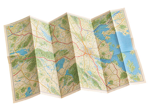 Folded topographic road map for travel planning and navigation isolated on transparent background.
