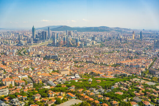 Panoramic view of Istanbul skyline featuring modern skyscrapers, historical buildings, and the Bosphorus Strait in Turkey on a clear sunny day Istanbul, Turkey