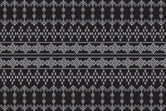 This image shows a traditional Thai fabric with an intricate geometric pattern. 