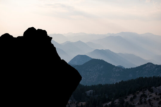 Expansive Nature View of Evergreen Mountains Fading into the Distance