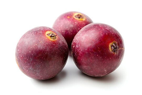 Three ripe purple star apples isolated on white background