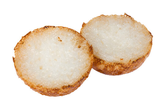Pair of Lao khao nom kok coconut-rice cakes, small hemispheres Isolated on White Background