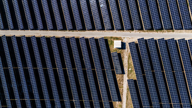Aerial view of solar panels arranged in rows at a solar farm in Temerin, Vojvodina, Serbia.