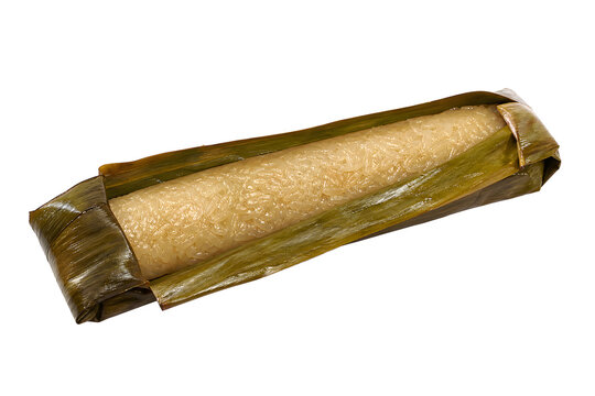 Filipino suman sa lihiya, long sticky-rice parcel partly opened Isolated on White Background
