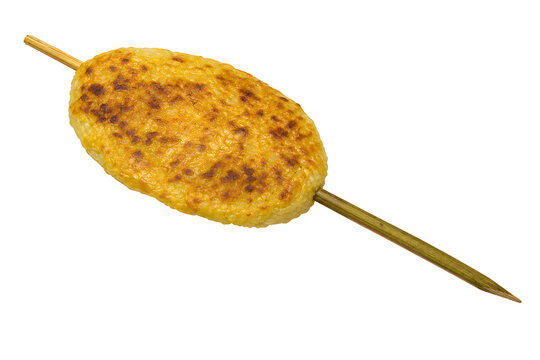 Lao khao jee, flattened oval sticky-rice patty on its integral bamboo Isolated on White Background