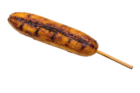 Filipino ginanggang, grilled saba banana on one integral stick Isolated on White Background