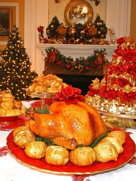 A lavish Christmas dinner table with roasted turkey, decorations, and a beautifully adorned fireplace and tree in the background