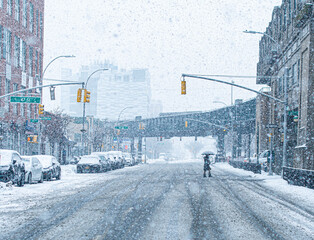 Fototapeta premium Heavy snow fall city streets traffic road cars vehicles winter copy space background bokeh image