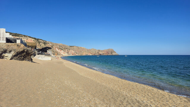 Explore the tranquil shores of Trypiti, Milos, in the sun-kissed South Aegean