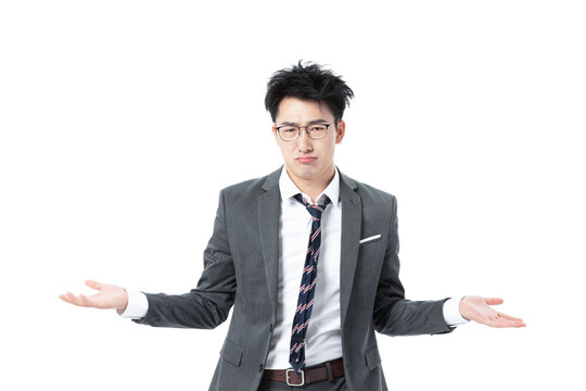 Confused Asian Businessman Shrugging with Open Palms on White Background