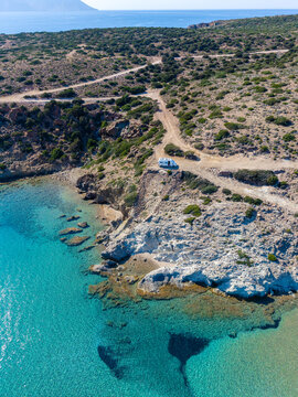 Stunning view of Agathia Beach in Milos, Greece with crystal clear waters and rugged coastline