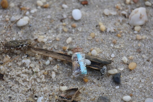A message in a small bottle washed up on the beach.