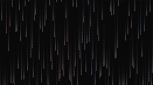 Vertical glowing white light streaks falling on black background