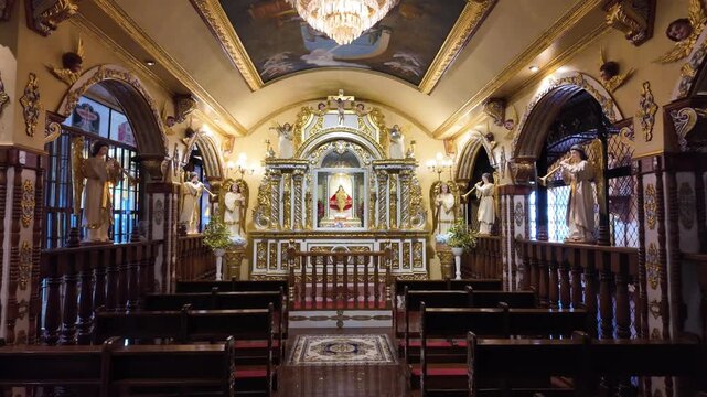 Ornate chapel altar and pews at Simala Shrine in Cebu