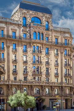 Barcelona, ​​Spain - April 14, 2024: Hotel Ohla Barcelona, ​​located on Via Laietana. The fa&ccedil;ade was created by artist Frederic Amat and consists of hundreds of eye-shaped ceramic elements (eyeballs).