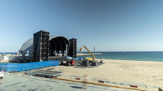 a music stage under construction for a music festival on the beach in barcelona